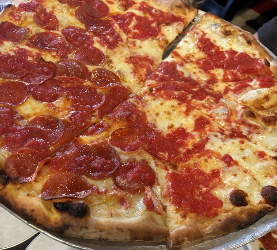 Coal-fired half-pepperoni, half-cheese pie at John's of Bleecker Street